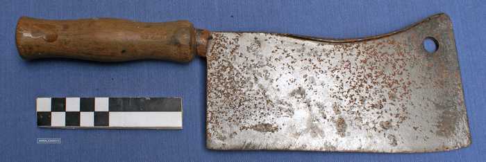 Gesmeed kapmes met houten handvat