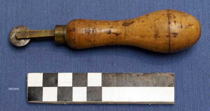 Zoolwieltje met houten handvat