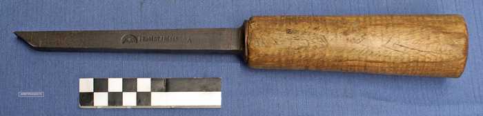 Beitel met houten handvat