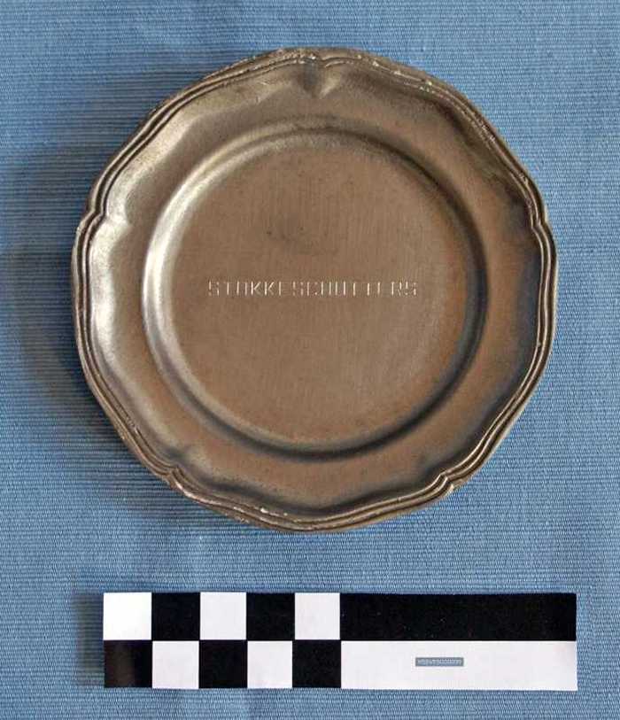 Tinnen bordje `STOKKESCHUTTERS