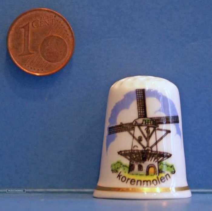 Vingerhoed met de afbeelding van een korenmolen.