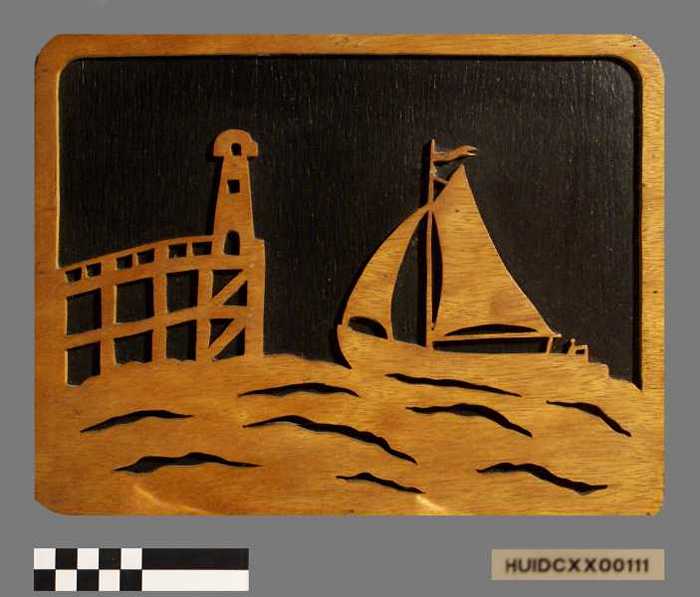 Houten kader met jacht en vuurtoren