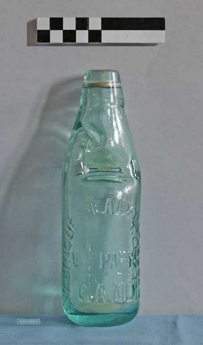 Leeg limonadeflesje (met knikker)