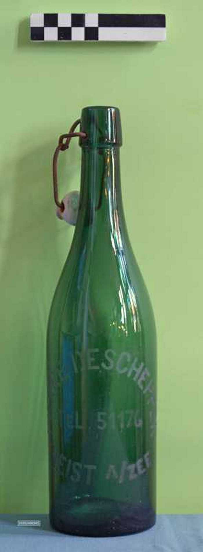 Lege bierfles van De Schepper