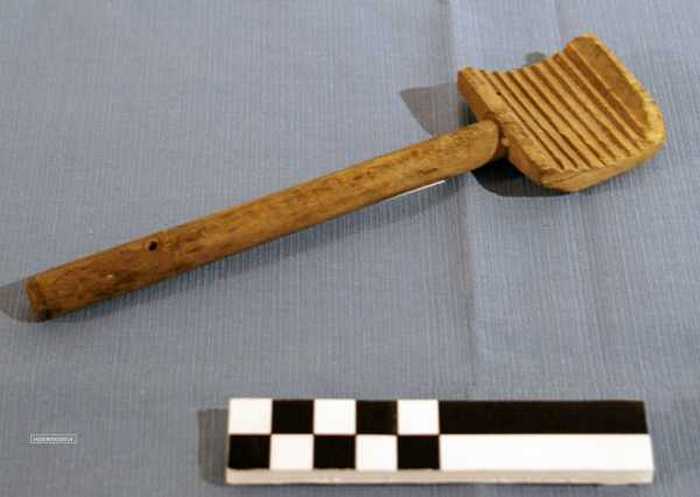 Houten schraper voor boter