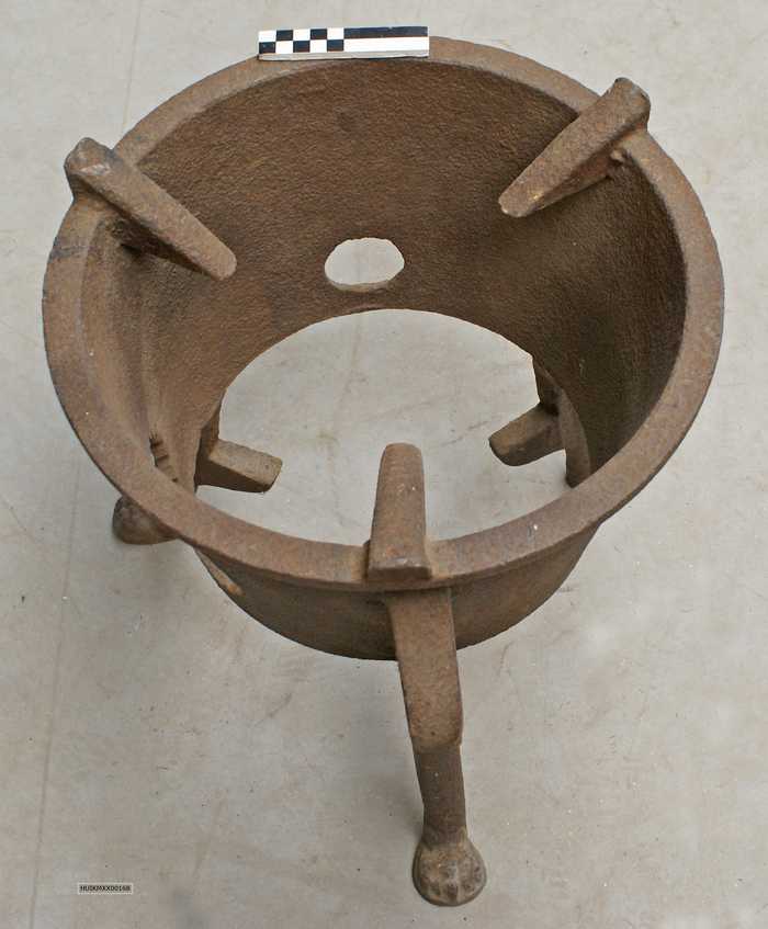 Steun voor kookpotten in open haard