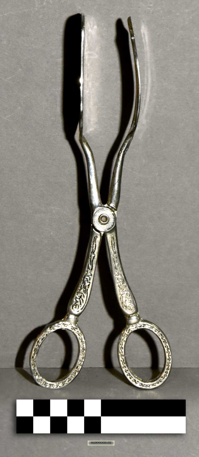 Zilveren schepper voor beleg of vlees