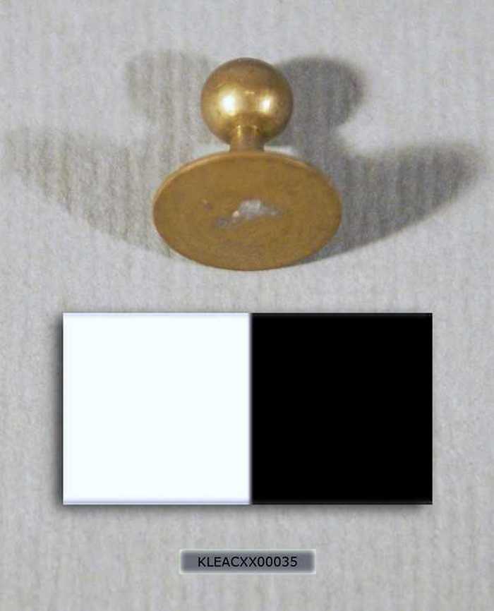 Koperkleurige manchetknoop