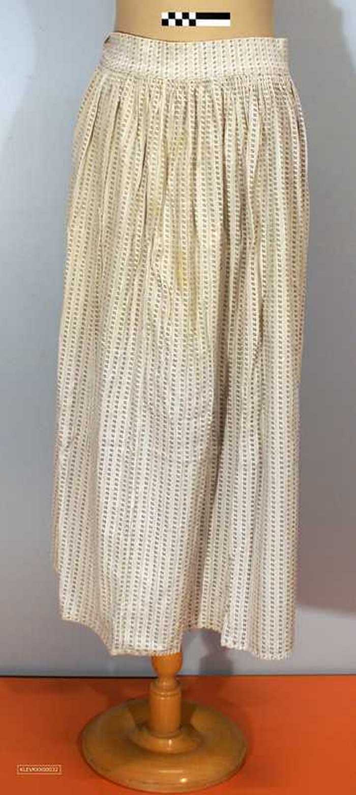 Wit met grijze schort