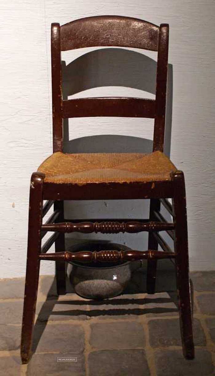 Stoel met rieten zitting