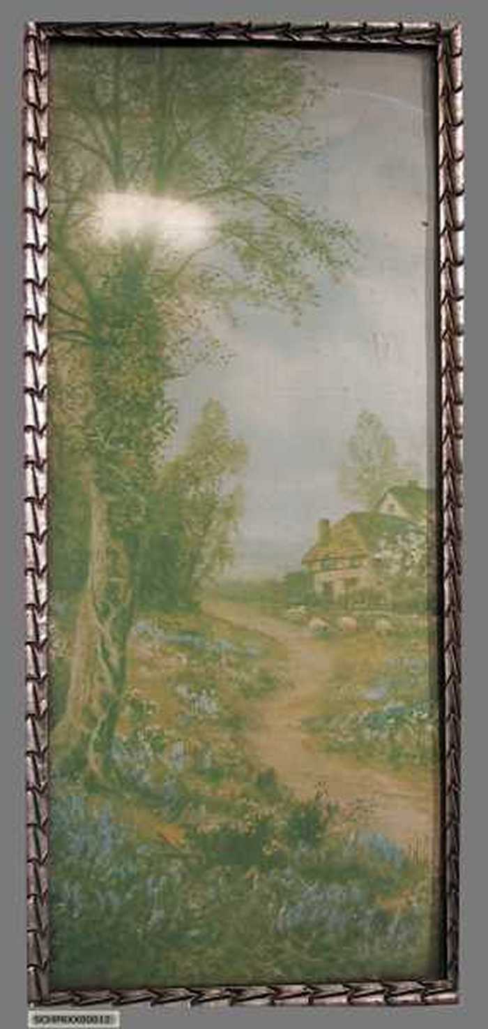 Huis langs een landweg.