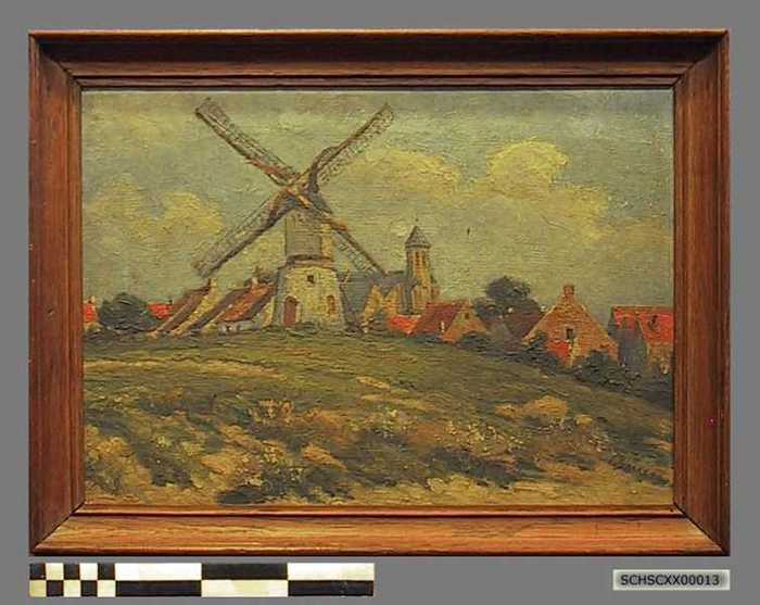 De Meermin molen en de oude Margarethakerk te Knokke.