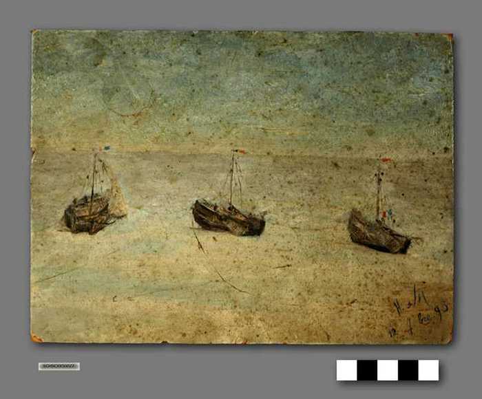 Drie bootjes op het strand